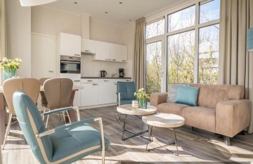 De Cocksdorp Ski Chalet | Cozy Chalet Near North Sea