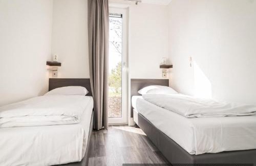 De Cocksdorp Ski Chalet | Cozy Chalet Near North Sea