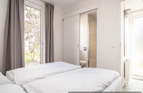 De Cocksdorp Ski Chalet | Cozy Chalet Near North Sea