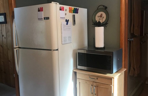 Stone Lake Cottage | Cozy Cottage. Walking distance to town. Just off the snowmobile and ATV trails.