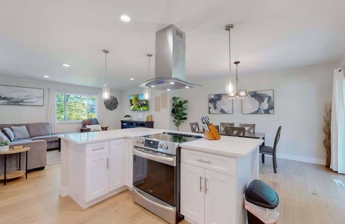 Castlewood House | Cozy Four Bedroom Family Retreat with Yard and Air Hockey