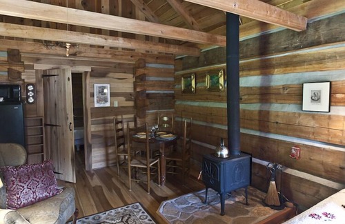 Barnardsville Cabin | Cozy Historic Cabin Retreat - visit trails right off of the farm. Pet Friendly.