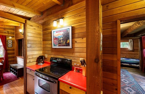 Brightwood Cabin | Cozy riverfront cabin with wood-burning fireplace, lovely deck, and washer/dryer
