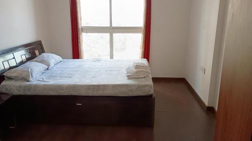 Kadadhe Apartment | Cozy Serene 1BHK in Lodha Belmondo Golf Resort, Pune