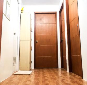 Caloocan Apartment | Cozy Three-Bedroom Staycation House with Netflix, Wi-Fi, and Free Parking Garage near SM Caloocan