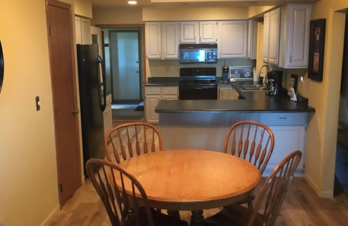 Oshkosh House | Cozy year round Lake Front Vacation Home