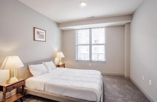 Central Business District Apartment | CozySuites at the Banks gym pool 13