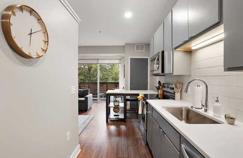 Downtown Minneapolis Apartment | CozySuites Marquee | pool, gym #01