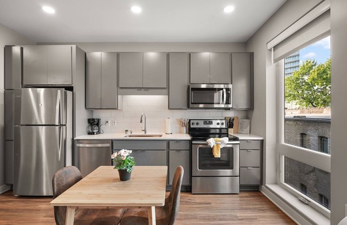 Downtown Minneapolis Apartment | CozySuites Marquee | pool, gym #03