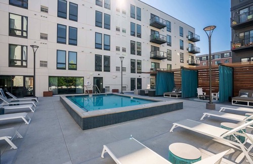 Downtown Minneapolis Apartment | CozySuites Marquee | pool, gym #03