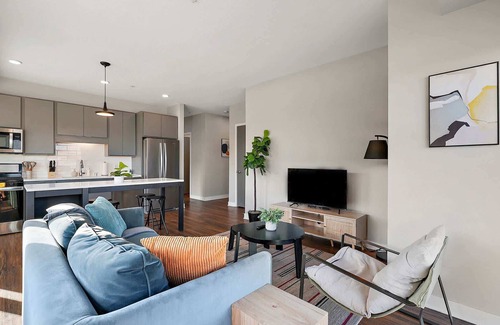 Downtown Minneapolis Apartment | CozySuites Marquee | pool, gym #04