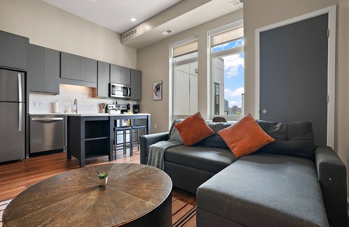 Downtown Minneapolis Apartment | CozySuites Marquee | pool, gym #05