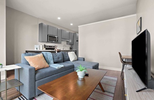 Downtown Minneapolis Apartment | CozySuites Marquee | pool, gym #06