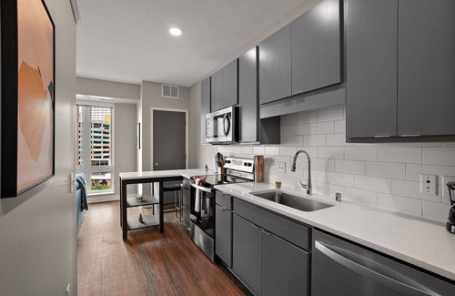 Downtown Minneapolis Apartment | CozySuites Marquee | pool, gym #06