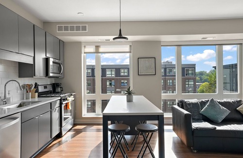 Downtown Minneapolis Apartment | CozySuites Marquee | pool, gym #11