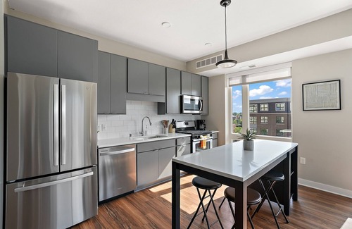 Downtown Minneapolis Apartment | CozySuites Marquee | pool, gym #11