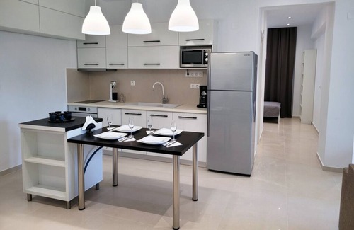 Agios Dimitrios Apartment | Crete aparthouse NortnModern Apartment with Shared Sea View Patio near beach