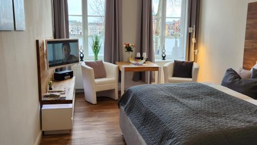 Schwerin Apartment | Das Ferienapartment Alexandrine direkt am Pfaffenteich mit eigenem Parkplatz