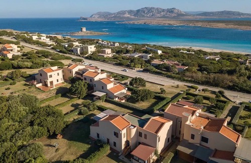 Stintino Apartment | Delightful sea view apartment with veranda