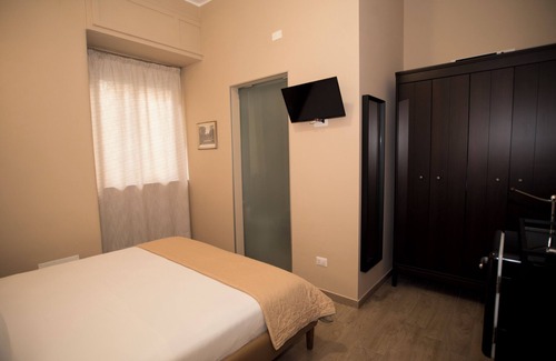 Cibali Apartment | Deluxe room with private bathroom.