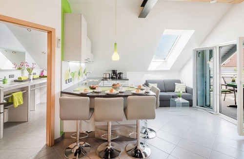 Bensheim Condo | Design apartment for 1-5 people with 2 bedrooms & roof terrace. Near bathing lake