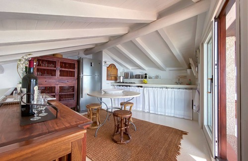 Porto Rotondo Apartment | Designer apartment overlooking the bay. Shared pool, access to the sea