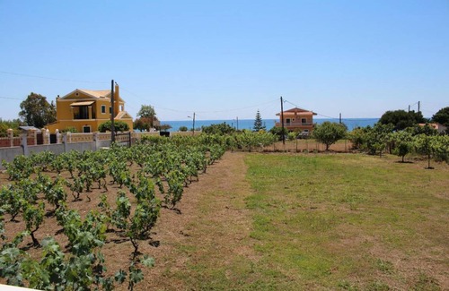 Agios Matthaios House | Detached holiday house at the sea, big garden, Wifi Skidi, Corfu