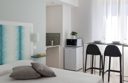 Syracuse Apartment | Dioniso Smart Suite with balcony by Wonderful Italy