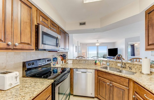 Seawinds Condo Condo | Direct oceanfront condo with large private balcony, seasonally heated pool, and garage parking