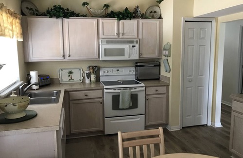 Clear Creek House | Disney Area Vacation Home with south facing salt water Pool, 15 mins. to Disney