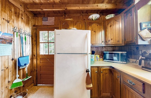 Ellsworth Cabin | Dog-friendly beach home on Green Lake with views, fireplace, dock, canoe & kayak