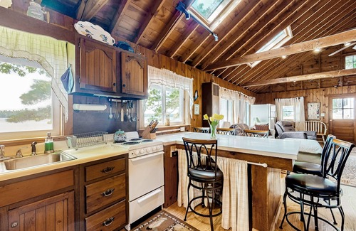 Ellsworth Cabin | Dog-friendly beach home on Green Lake with views, fireplace, dock, canoe & kayak