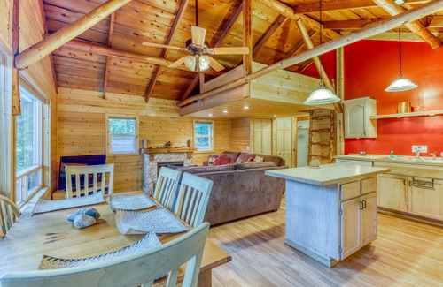 Gold Bar Cottage | Dog-friendly cottage on the river with private hot tub, mountain views & firepit
