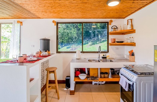Roble House | Dog-friendly jungle cabana with scenic views, wraparound balcony, & WiFi