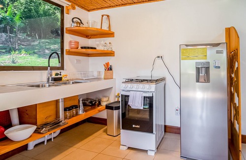 Roble House | Dog-friendly jungle cabana with scenic views, wraparound balcony, & WiFi