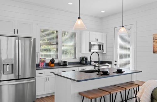 Sevierville Cabin | Dog-friendly Lakefront home w/private pool, game room, & free attraction tickets