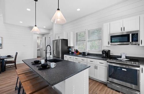 Sevierville Cabin | Dog-friendly Lakefront home w/private pool, game room, & free attraction tickets