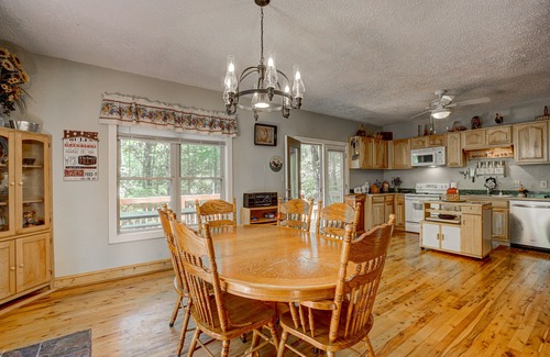 Wiley Cabin | Dog-friendly riverfront cabin with waterfall view, large decks, firepit, Ping-Pong