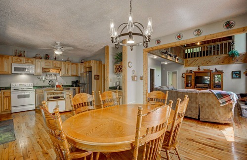 Wiley Cabin | Dog-friendly riverfront cabin with waterfall view, large decks, firepit, Ping-Pong