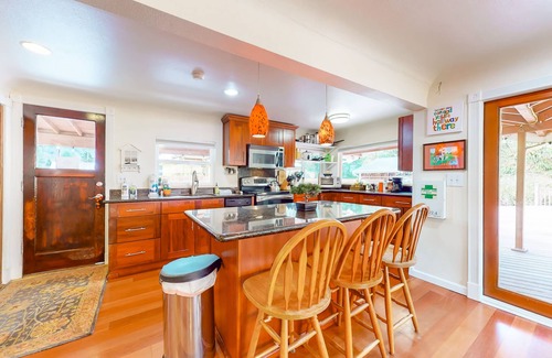 Maplewood House | Dog-friendly riverfront home with patio, golf nearby, enclosed yard, & W/D