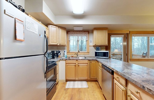 Whittier Cabin | Dog-friendly Smoky Mountain cabin with fireplace, charming deck & game loft