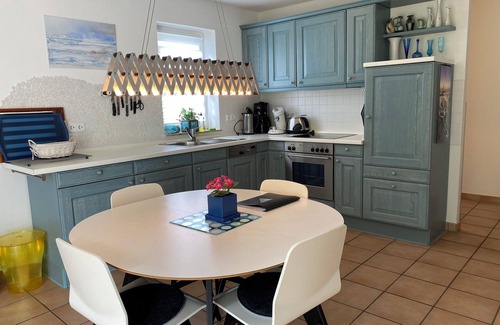 Wieck auf dem Darss Apartment | Don't rush me - modern ground floor apartment with south-facing terrace & beach chair in Wieck a. Darß