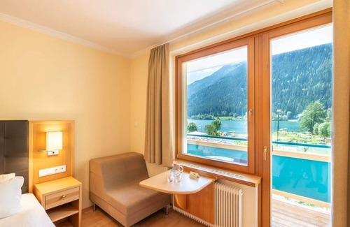 Feld am See House | Doppelzimmer "tennisfan" 4-6 N - Familien-sportresort Brennseehof