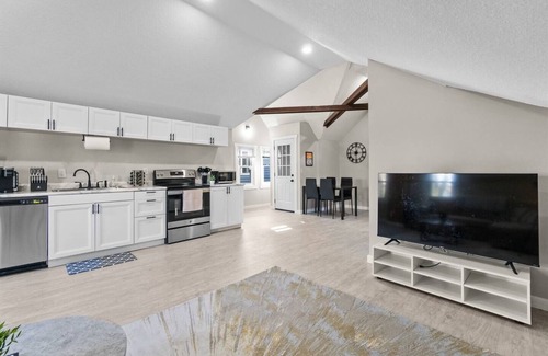 West Central Apartment | Downtown Apt with Wooden Beams & Brick Accents