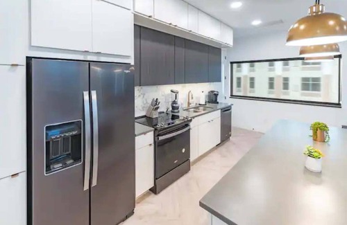 Appleton Apartment | Downtown! Brand New, Modern, Massive Patio, Great Kitchen + Game Room & Theater.