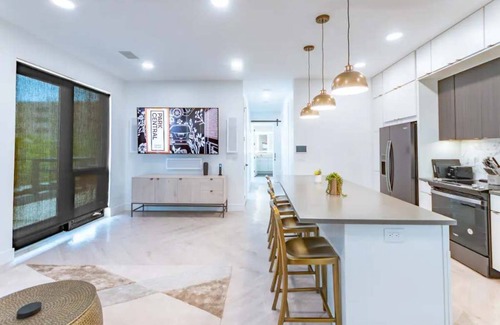 Appleton Apartment | Downtown! Brand New, Modern, Massive Patio, Great Kitchen + Game Room & Theater.