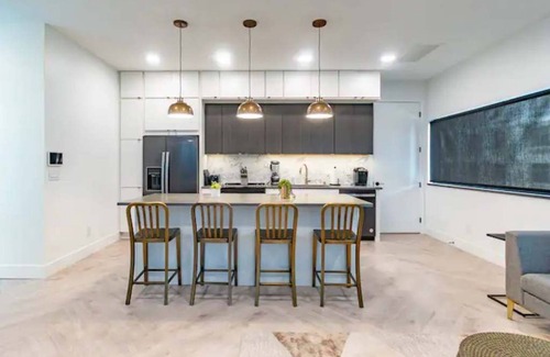 Appleton Apartment | Downtown! Brand New, Modern, Massive Patio, Great Kitchen + Game Room & Theater.