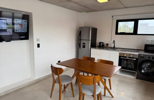 Pinamar Apartment | Downtown Getaway with Garage and Balcony