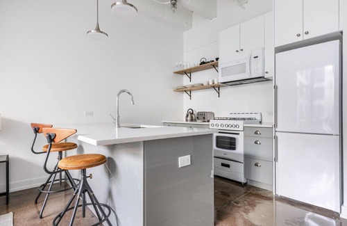 Uptown Apartment | Dreamy Uptown 1BR w/Gym, Rooftop Pool, 2 blocks to L, by Blueground