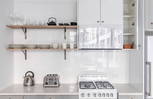 Uptown Apartment | Dreamy Uptown 1BR w/Gym, Rooftop Pool, 2 blocks to L, by Blueground